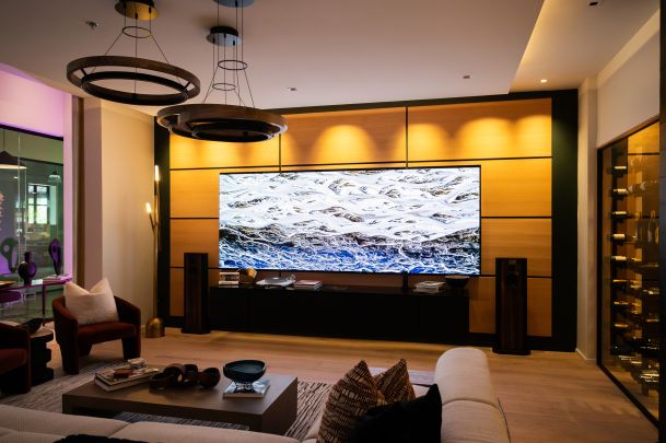 Contemporary living room with sleek furniture and a Just Video Walls